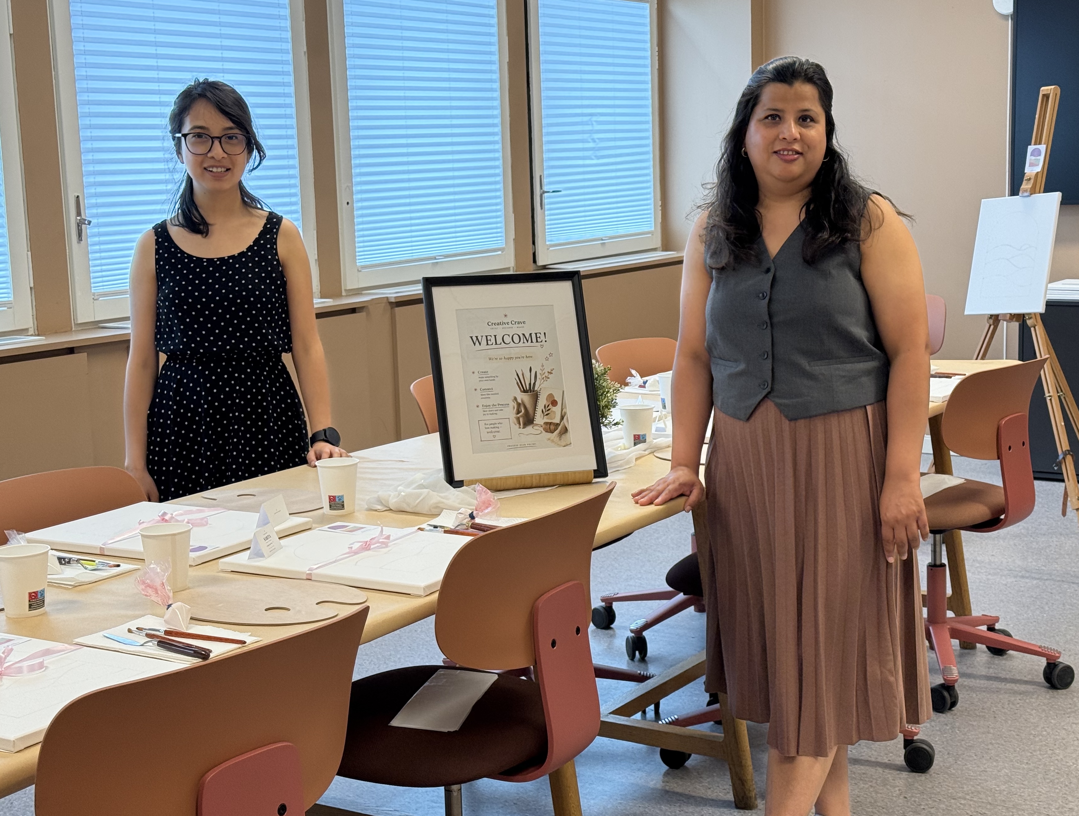 Preeti and Marisha at the welcome table